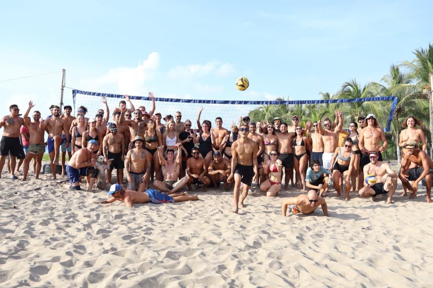 A large group of players together at the net after a session.